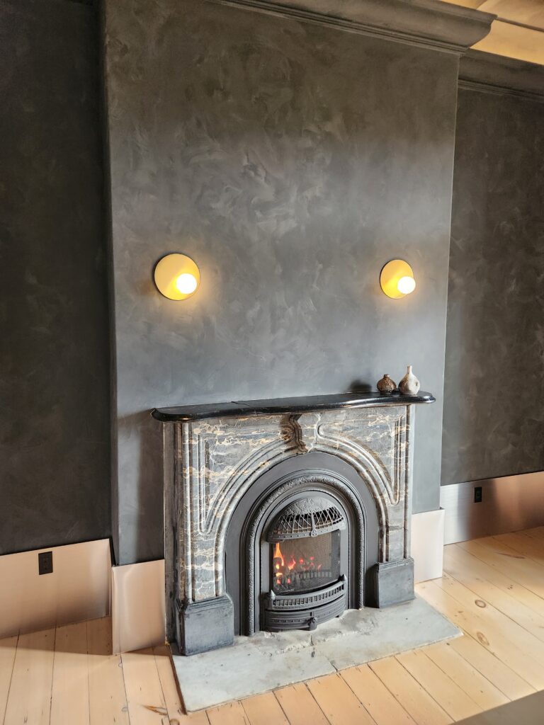 Lune 1860 dark room fireplace